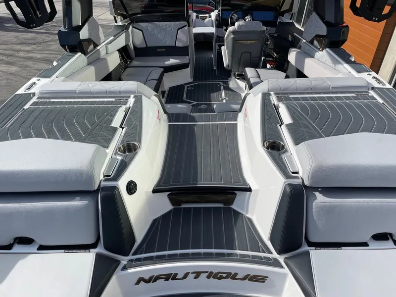 Slide: The Image of 2023 Nautique Super Air Nautique G23 Paragon interior with sleek seating and modern design. - 4