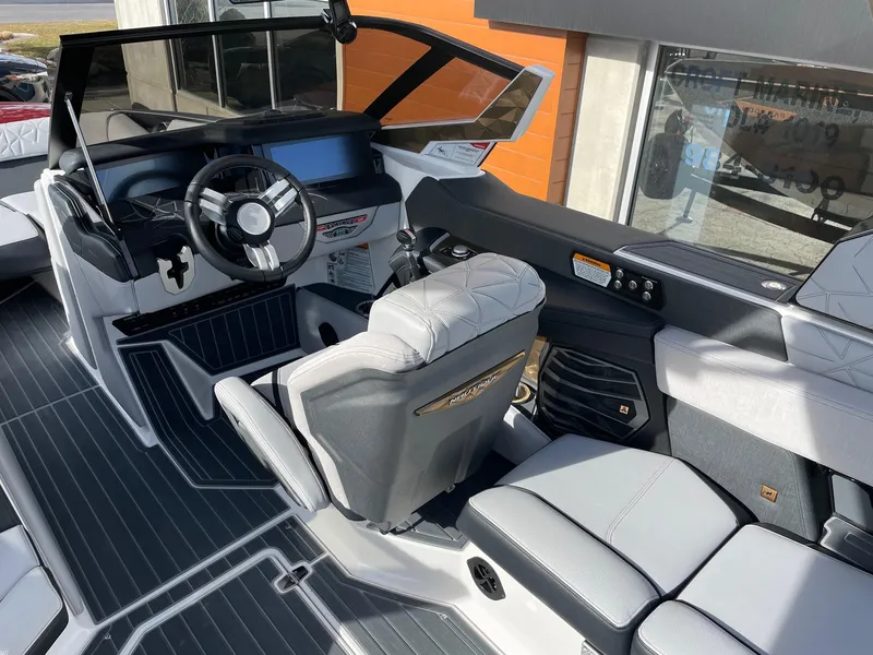 Slide: The Image of 2023 Nautique Super Air Nautique G23 Paragon interior with modern dashboard and seating. - 6