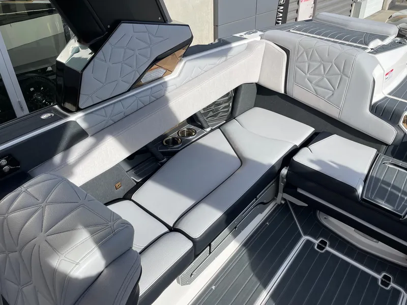 Slide: The Image of 2023 Nautique Super Air Nautique G23 Paragon interior with luxurious seating and modern design. - 7