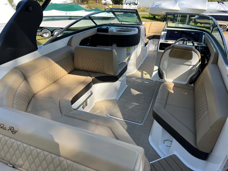 Slide: The Image of 2022 Sea Ray SLX 250 boat interior with luxurious seating and modern design. - 31