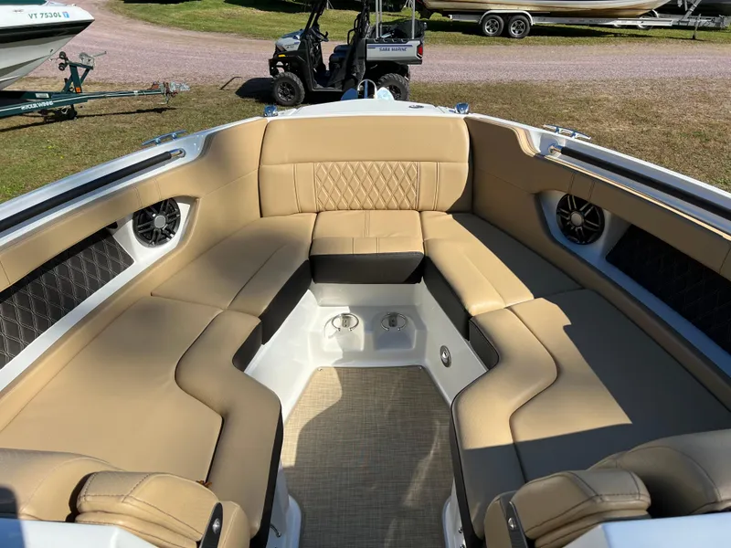 Slide: The Image of Luxurious interior of 2022 Sea Ray SLX 250 boat with tan leather seating. - 41