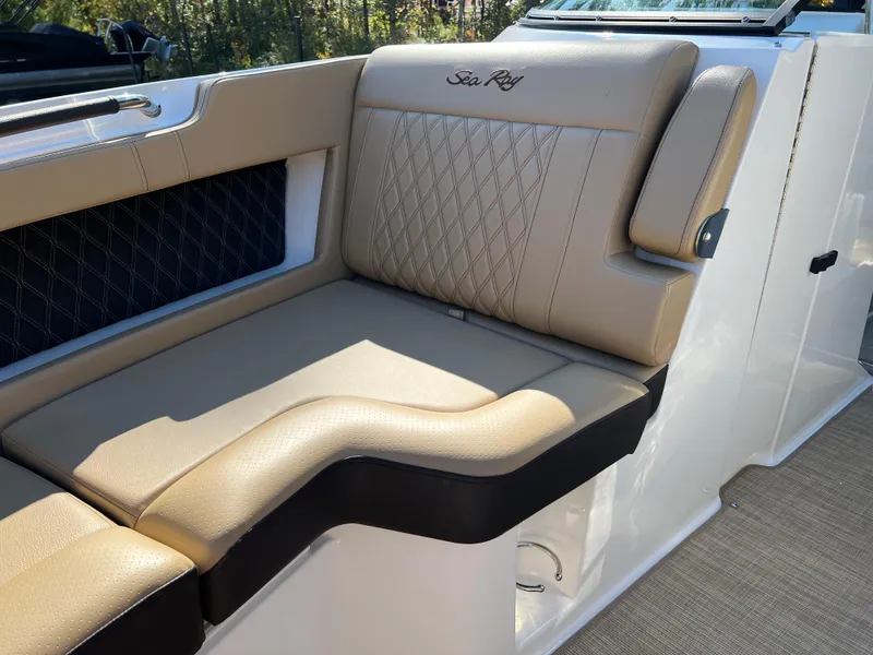 Slide: The Image of Luxurious seating on 2022 Sea Ray SLX 250 boat with tan upholstery. - 43