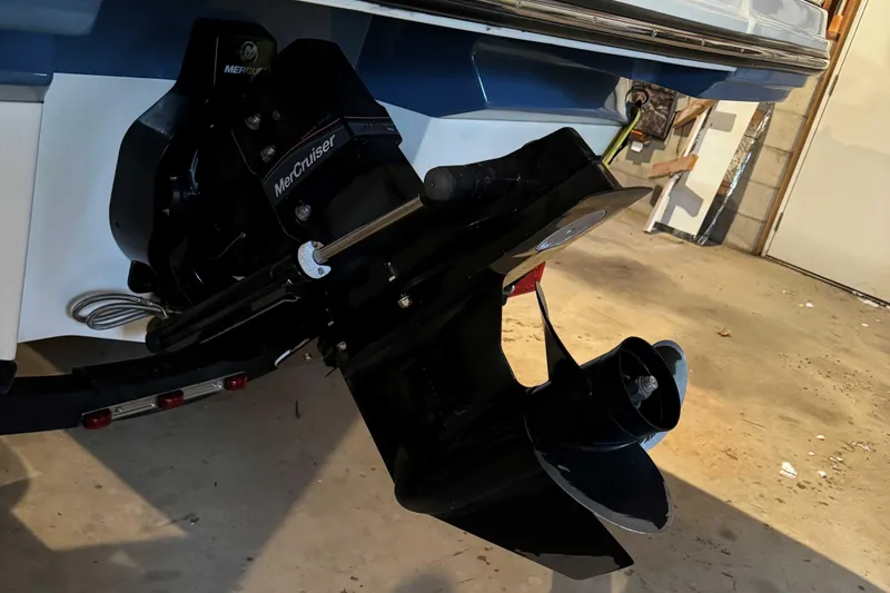 Slide: The Image of 2022 Sea Ray SPX 190 boat with MerCruiser engine in a garage. - 14
