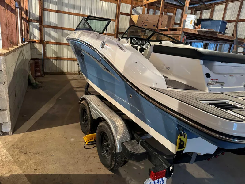 Slide: The Image of 2022 Sea Ray SPX 190 boat on trailer in a storage facility. - 3