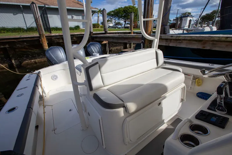 Slide: The Image of 2015 Yellowfin 39 Offshore boat interior with seating and controls. - 12