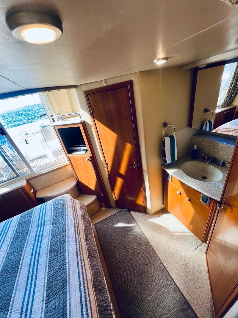 Slide: The Image of Shower area in 2004 Meridian 459 Motoryacht, featuring modern fixtures and compact design. - 12