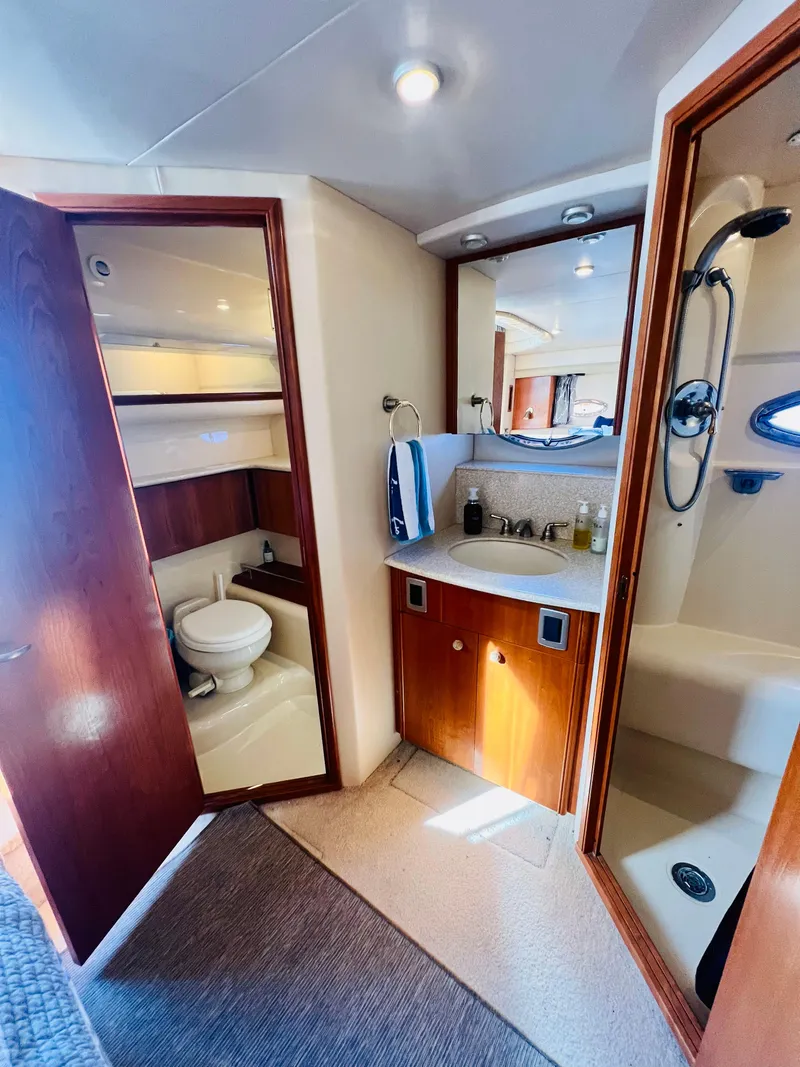 Slide: The Image of Interior of 2004 Meridian 459 Motoryacht with kitchen and seating area. - 14