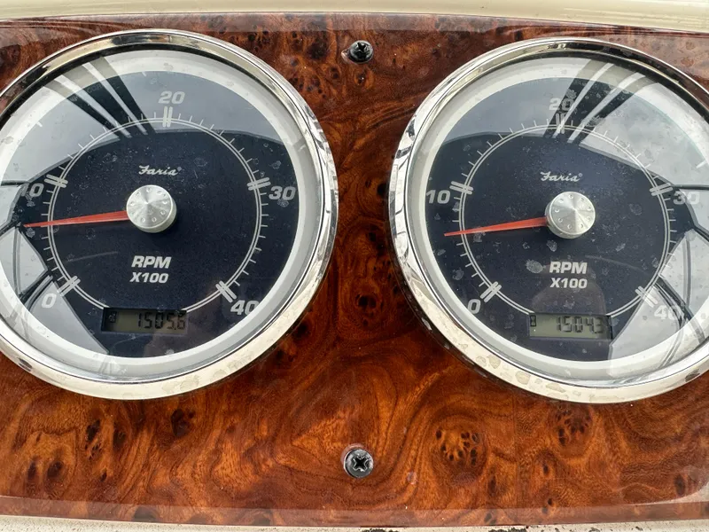 Slide: The Image of Dashboard of 2004 Meridian 459 Motoryacht with gauges and compass. - 19