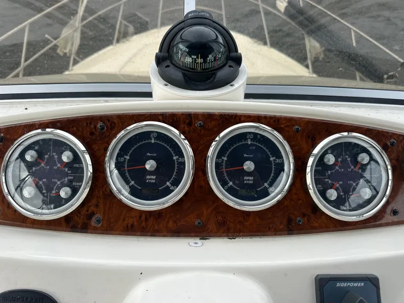 Slide: The Image of 2004 Meridian 459 Motoryacht on a serene lake with scenic background. - 20