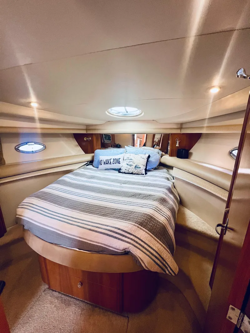 Slide: The Image of 2004 Meridian 459 Motoryacht bathroom with shower, sink, and toilet. - 7