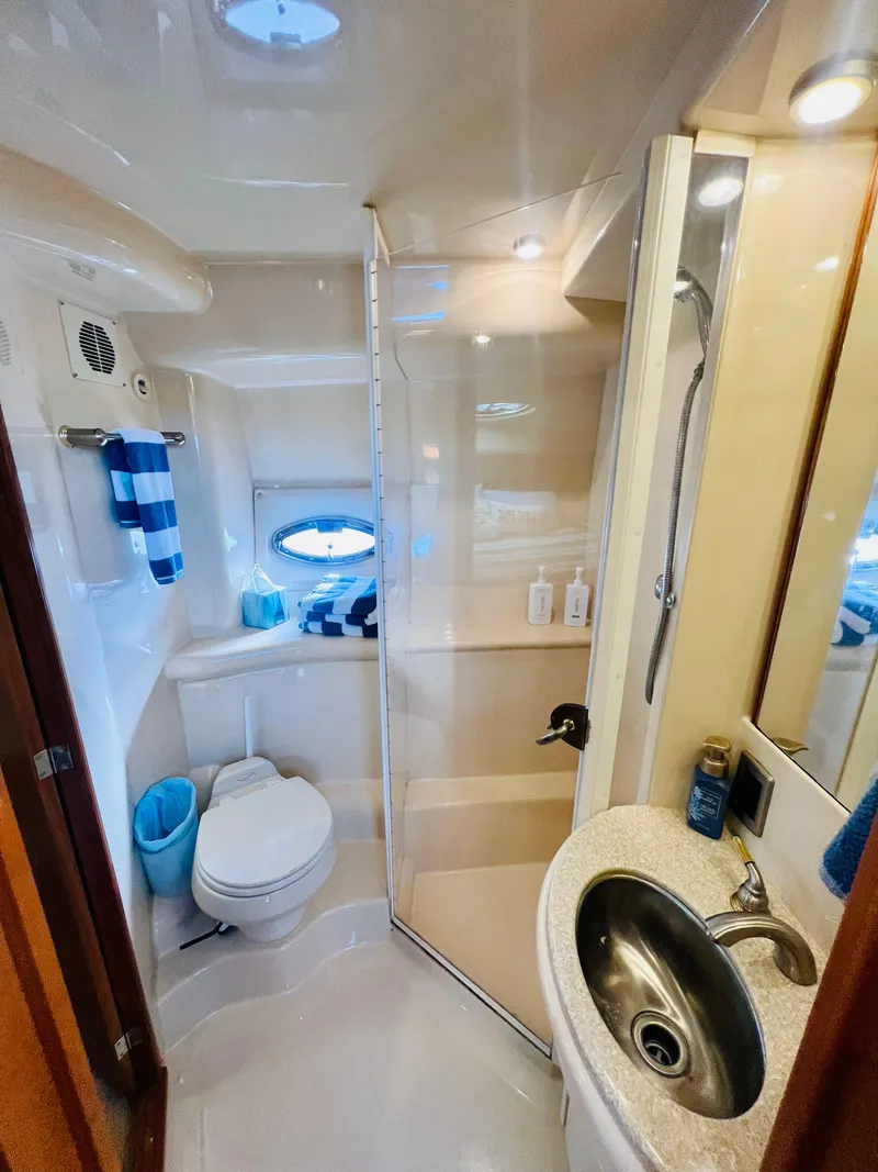 Slide: The Image of Luxurious interior of 2004 Meridian 459 Motoryacht with leather seating and elegant decor. - 8