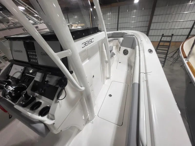 Slide: The Image of 2022 Fountain 38 SC boat interior with modern controls and sleek design. - 32