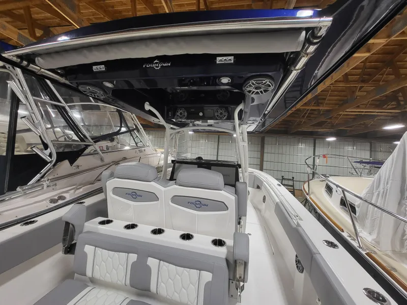 Slide: The Image of 2022 Fountain 38 SC boat interior with modern seating and sleek design. - 37