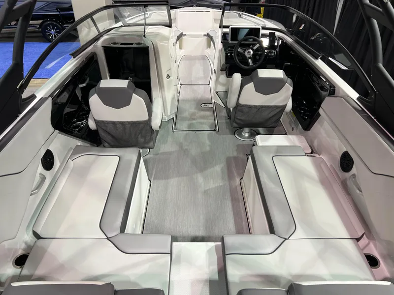 Slide: The Image of 2025 Yamaha Boats AR250 interior with modern seating and sleek design. - 5
