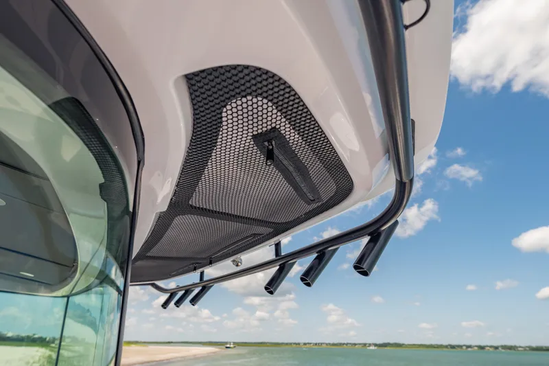 Slide: The Image of Close-up of 2025 Axopar 45 XC Cross Cabin roof detail against blue sky. - 30