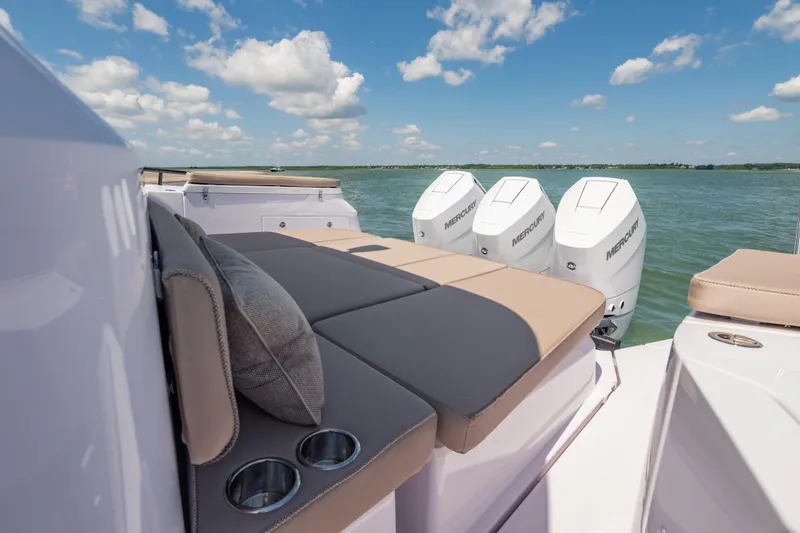 Slide: The Image of Luxurious Axopar 45 XC Cross Cabin 2025 with Mercury engines on a sunny day. - 17