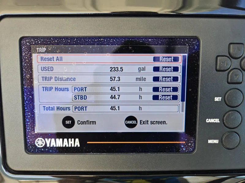 Slide: The Image of Yamaha boat display showing trip data: 233.5 gallons used, 57.3 miles traveled. - 17