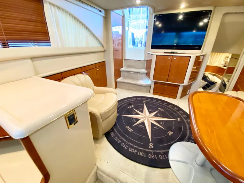 Slide: The Image of Luxurious interior of 2001 Sea Ray 380 Aft Cabin yacht with modern furnishings. - 18
