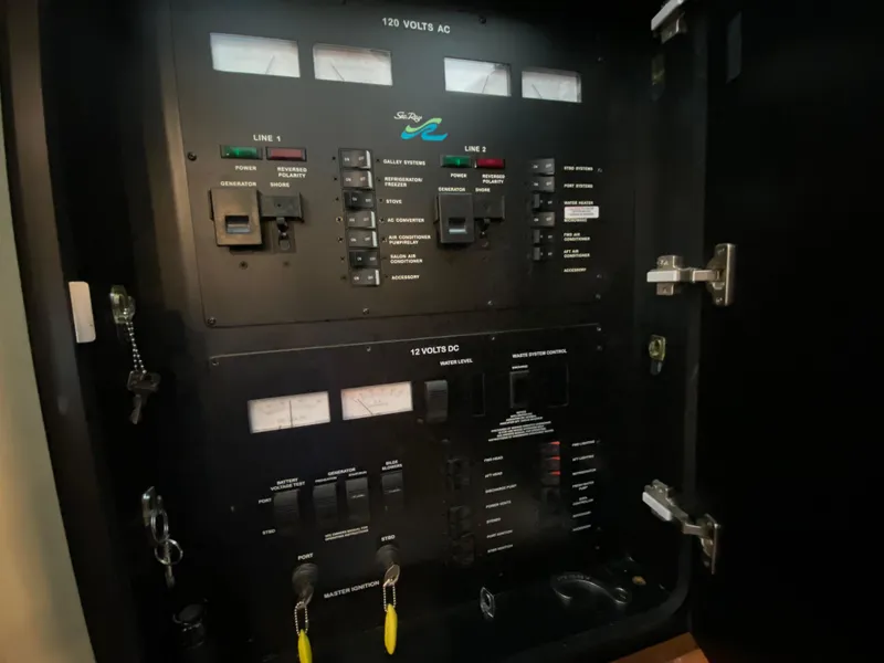 Slide: The Image of Electrical control panel of a 2001 Sea Ray 380 Aft Cabin boat. - 38