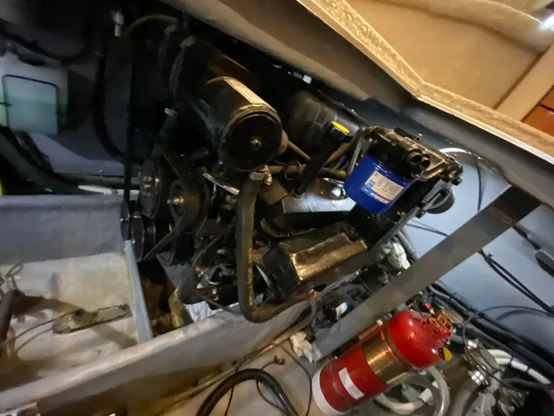 Slide: The Image of Engine compartment of 2001 Sea Ray 380 Aft Cabin with visible fire extinguisher. - 40