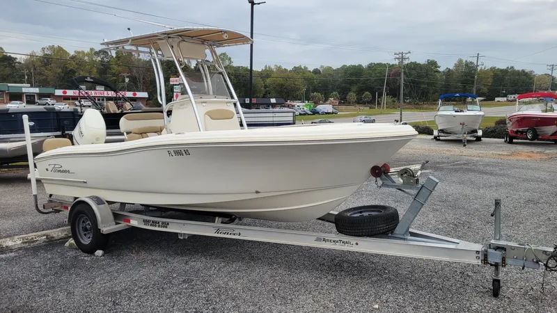 Slide: The Image of 2019 Pioneer 202 Sportfish boat on trailer in parking lot. - 10