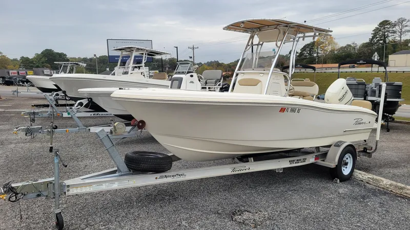 Slide: The Image of 2019 Pioneer 202 Sportfish boat on trailer in dealership lot. - 9