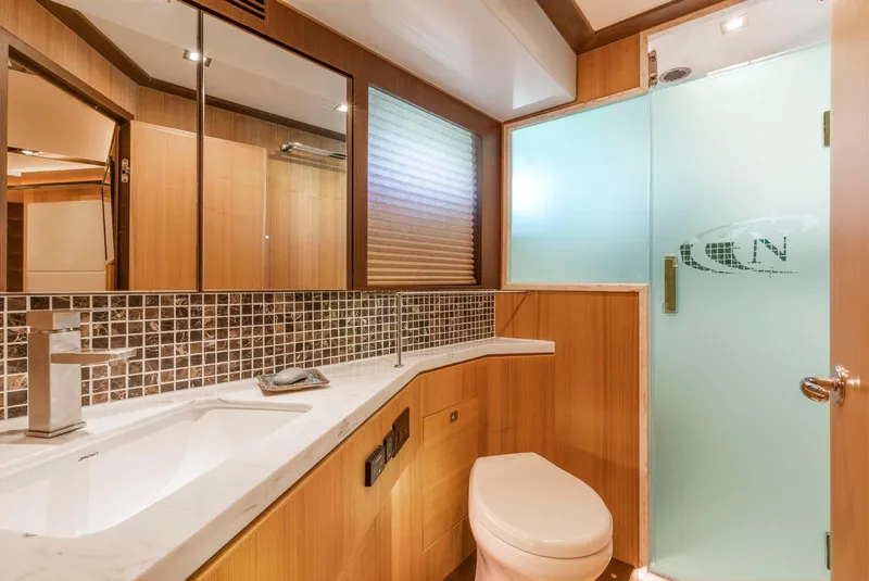 Slide: The Image of Luxurious bathroom in 2021 North Pacific 49 Euro Pilothouse yacht with modern fixtures. - 20