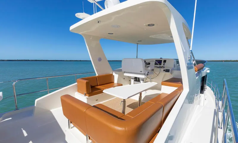 Slide: The Image of Luxurious 2021 North Pacific 49 Euro Pilothouse yacht with spacious outdoor seating. - 27