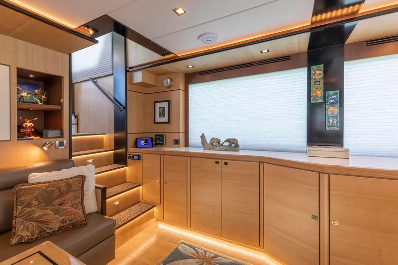 Slide: The Image of Luxurious interior of 2021 North Pacific 49 Euro Pilothouse yacht with modern wood finishes. - 6