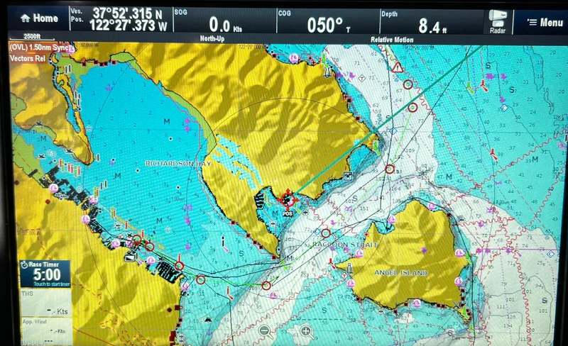 Slide: The Image of Nautical chart display on Nautor Swan 391, 1984 model, showing navigation route and coordinates. - 23