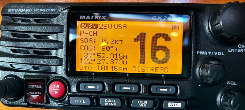 Slide: The Image of Standard Horizon Matrix GX2000 marine radio displaying channel 16 distress signal. - 24