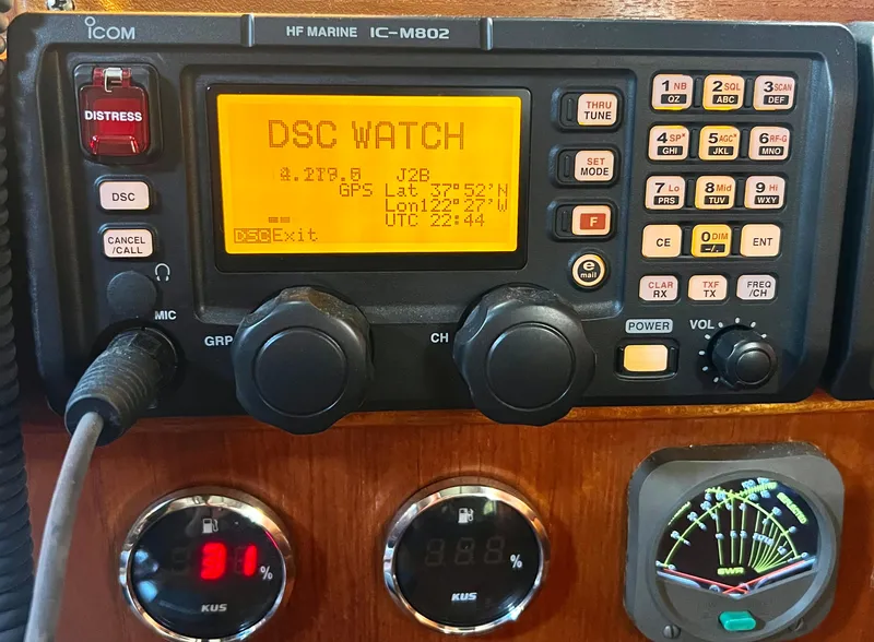 Slide: The Image of ICOM marine radio display on 1984 Nautor Swan 391 yacht, showing DSC watch and GPS coordinates. - 25