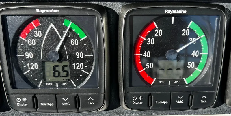Slide: The Image of Raymarine sailing instruments on a 1984 Nautor Swan 391 yacht dashboard. - 26