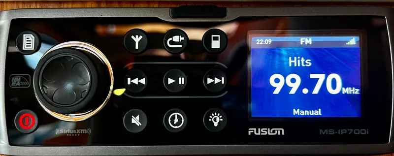 Slide: The Image of Fusion MS-IP700i stereo system displaying FM 99.70 MHz on a Nautor Swan 391, 1984 model. - 29