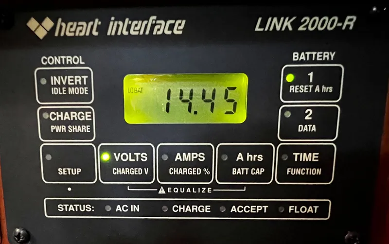 Slide: The Image of Heart Interface Link 2000-R control panel displaying voltage reading of 14.45 on Nautor Swan 391. - 30