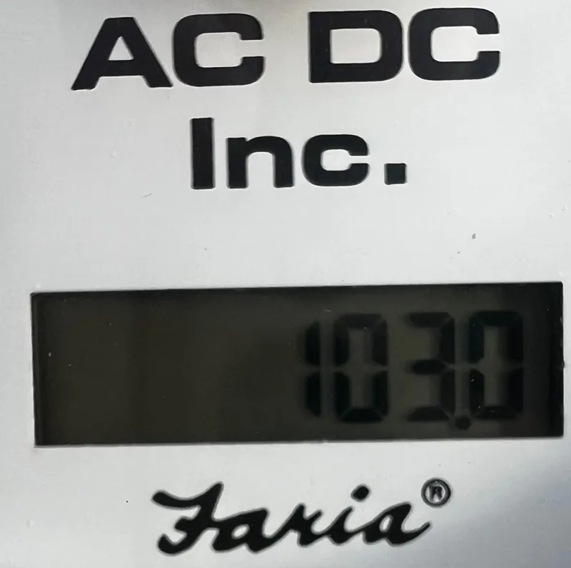 Slide: The Image of Faria gauge displaying 1030 hours, AC DC Inc. branding, Nautor Swan 391, 1984 model. - 32