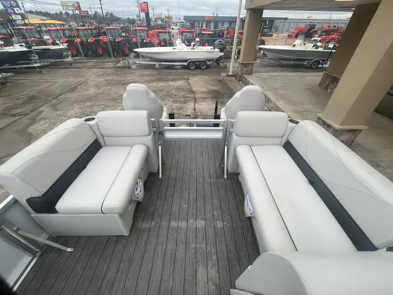 Slide: The Image of 2022 Avalon 2080 VENTURE FNC pontoon boat interior with gray seating and flooring. - 10
