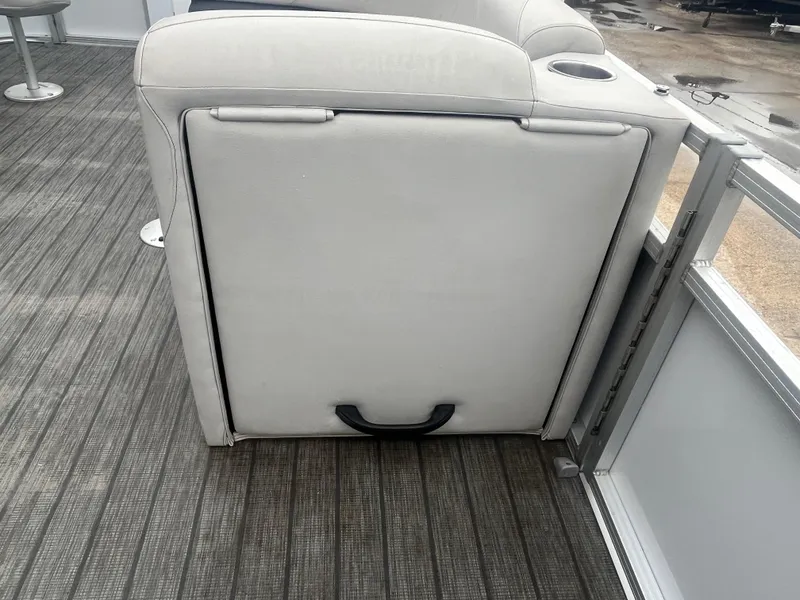 Slide: The Image of 2022 Avalon 2080 VENTURE FNC boat interior with gray seating and flooring. - 12