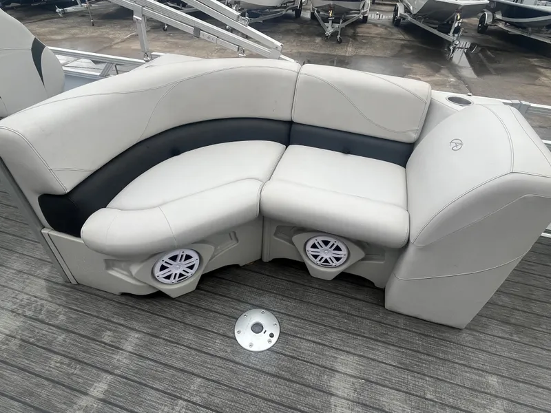 Slide: The Image of 2022 Avalon 2080 VENTURE FNC boat seating with integrated speakers on deck. - 13
