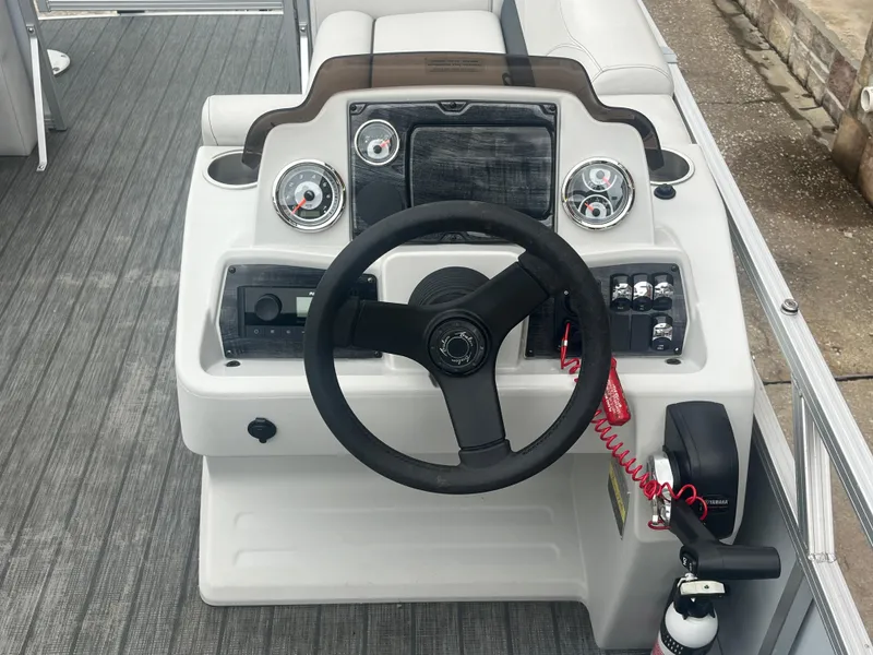 Slide: The Image of Steering console of 2022 Avalon 2080 VENTURE FNC boat with gauges and controls. - 15