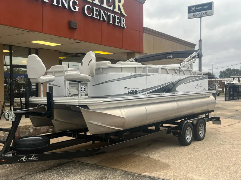 Slide: The Image of 2022 Avalon 2080 VENTURE FNC pontoon boat on trailer outside dealership. - 3