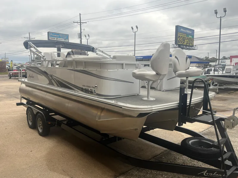 Slide: The Image of 2022 Avalon 2080 VENTURE FNC pontoon boat on trailer at dealership. - 5