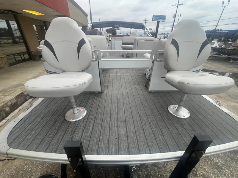 Slide: The Image of 2022 Avalon 2080 VENTURE FNC boat with swivel seats on deck. - 8