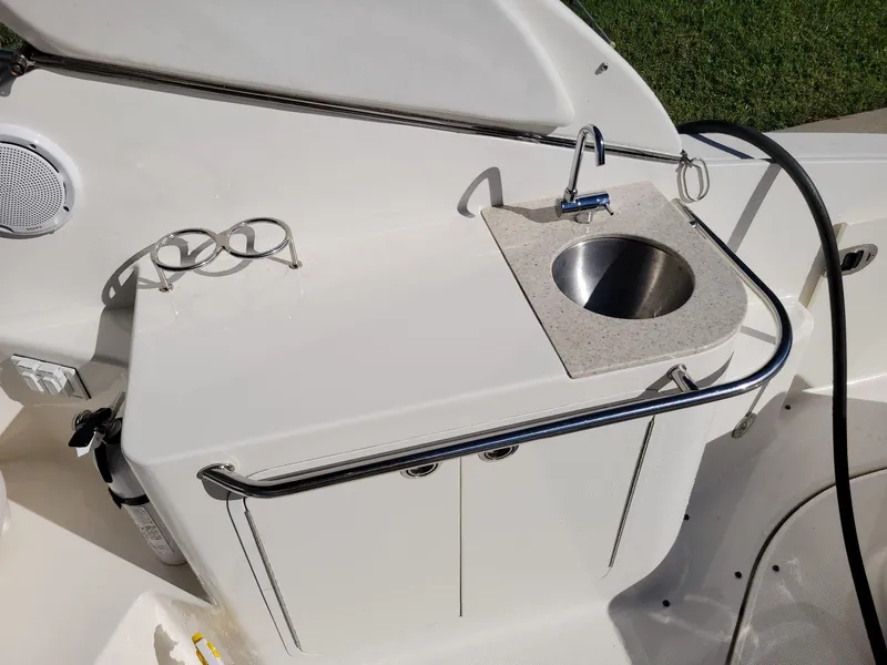 Slide: The Image of 2010 Sea Ray 280 Sundancer boat sink and countertop detail. - 15