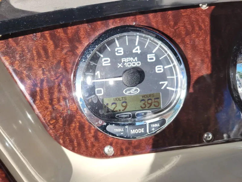 Slide: The Image of Tachometer of 2010 Sea Ray 280 Sundancer showing RPM, volts, and hours. - 19