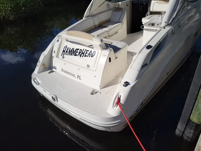 Slide: The Image of 2010 Sea Ray 280 Sundancer boat docked, named "Hammerhead," Bradenton, FL. - 5