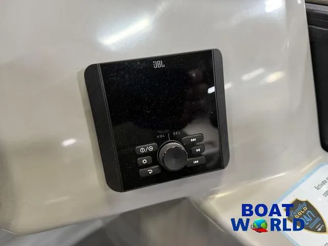 Slide: The Image of JBL audio control panel on 2025 Bentley Pontoons Legacy 200 Navigator Quad Lounge. - 16