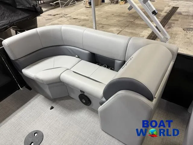 Slide: The Image of 2025 Bentley Pontoons Legacy 200 Navigator Quad Lounge interior with gray seating. - 18