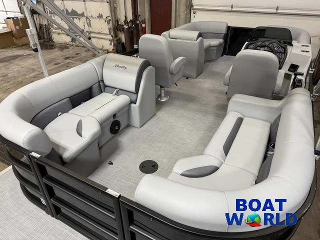 Slide: The Image of 2025 Bentley Pontoons Legacy 200 Navigator Quad Lounge interior with plush seating and modern design. - 20