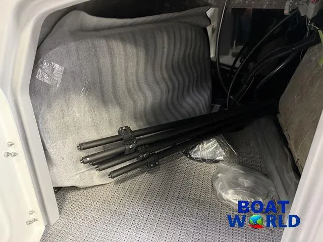 Slide: The Image of Interior storage of 2025 Bentley Pontoons Legacy 200 Navigator with accessories and equipment. - 28